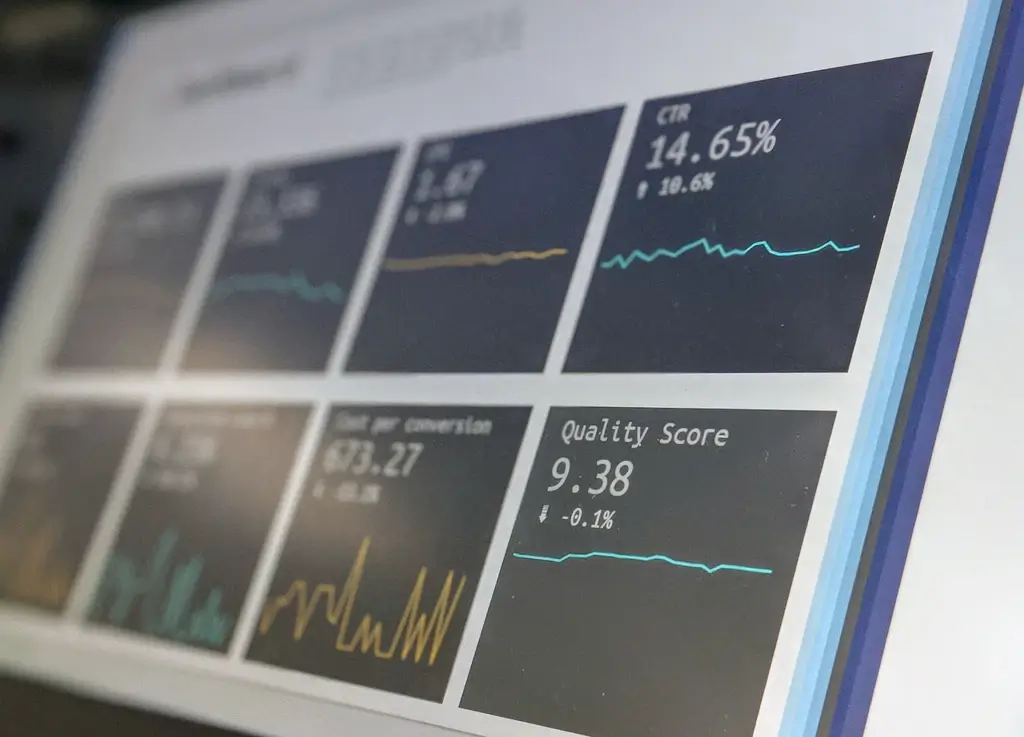 Close up view of a screen displaying a grid of analytics.